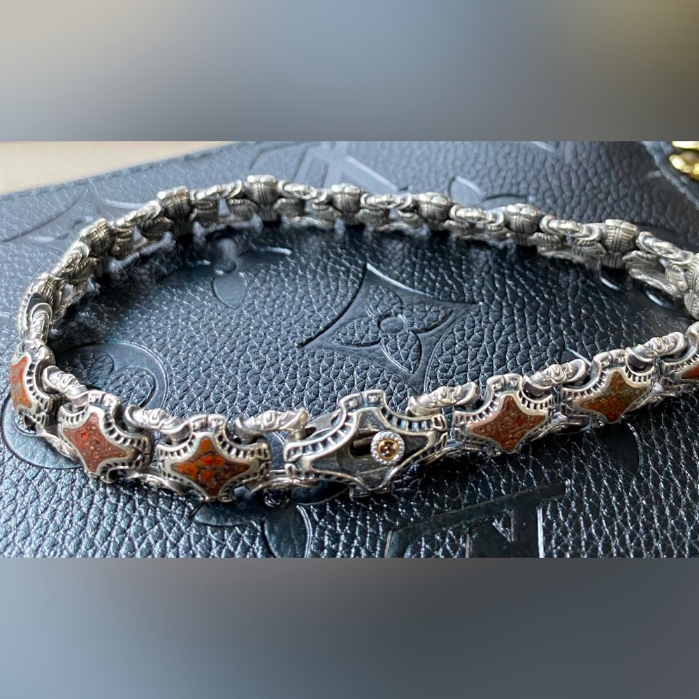 William Henry bracelet..(sterling silverver, diamonds, dinosaur bone)